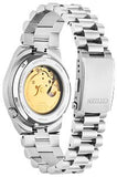 Silver watch with a gold mechanical face on a white background